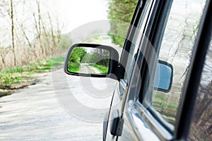 Landscape in the side view mirror