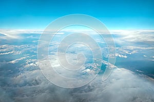 Landscape, the sky above the clouds. International cargo transportation, air travel, transport, air travel, vacation. Copy space