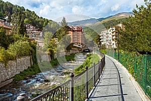 Landscape of a small town with fast river