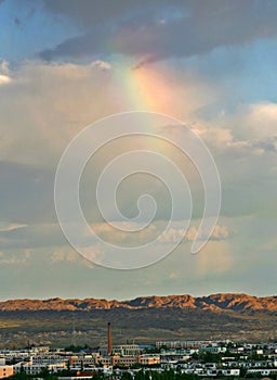 Landscape of a small town in Western China with rainbow