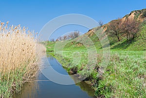 Landscape with small Ukrainian river Sura