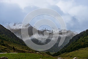 Landscape of snow-capped Pyrenean peaks, in the Ossau valley, in BÃ©arn, France