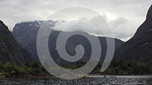 Landscape of snow mountain panorama background of water surface in New Zealand.