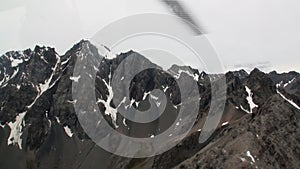 Landscape of snow mountain panorama view from helicopter window in New Zealand.