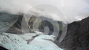 Landscape of snow mountain panorama view from helicopter window in New Zealand.