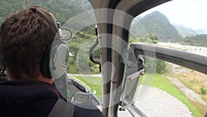 Landscape of snow mountain panorama view from helicopter window in New Zealand.