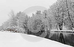 Landscape snow scene-river and trees- Nuremberg, Germany- river Pegnitz