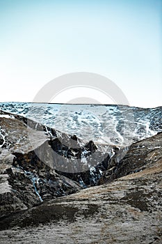 Landscape with snowy mountain rocks, Iceland
