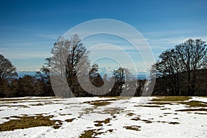 Landscape with snowy patches in spring. Jurassic mountains