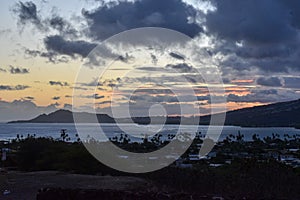 Landscape from the southshore of Oahu looking towards Diamond Head at sunset.