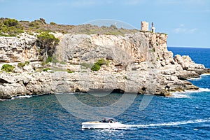 Landscape of Spain Island Mallorca Cala Figuera, speed boat, Motorboat sailing on the sea