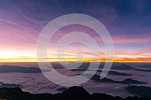 Landscape / starscape of the mountain and sea of mist in winter sunrise view from top of Doi Pha Tang mountain , Chiang Rai,