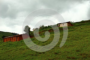 Landscape of stone house and cloudy sky