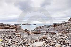 Landscape of a stony beach in the south of Iceland