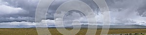 Landscape stormy panorama view from the border of Utah and Idaho from Interstate 84, I-84, view of rural farming with sheep and co