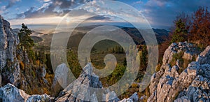 Landscape with sunrise and rocks with a view. Mountain landscape, fog in the valley of turiec region.