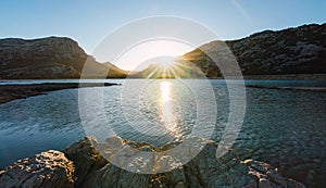 Landscape at sunset in Cuber Majorca. Sunset on a mountain lake.