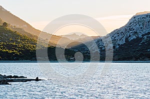 Landscape at sunset in Cuber Majorca. Sunset on a mountain lake.