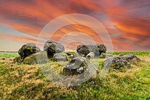 Landscape during sunset with the remains of a Megalithic burial monument, Dolmen D15