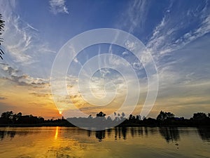 Landscape of Sunset at the river with Beautiful Sky and clound in evening