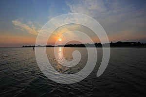 Landscape sunset on the sea in Grado