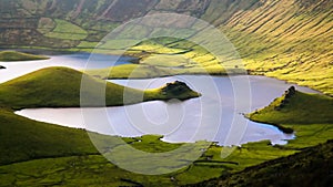 Landscape sunset view to Caldeirao crater, Corvo island, Azores, Portugal