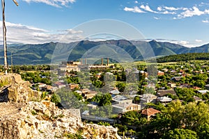 Landscape of Surami, small town in Georgia with ruins of old Soviet era soda factory and rural architecture