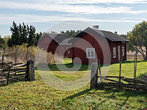 Landscape in Sweden with typically red house