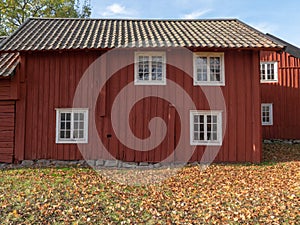 Landscape in Sweden with typically red house