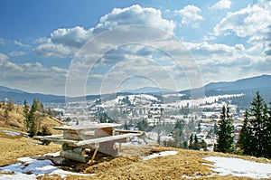 Landscape with table and view of village in mountain