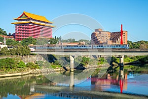 Landscape of taipei by the river with grand hotel