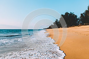 Landscape of tidal wave on the beach, gold sand, blue sky. Thailand