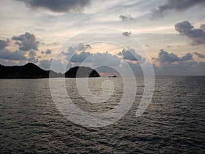landscape with the tip of the island of La Roqueta in Acapulco at dusk photo