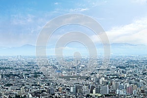 Landscape of tokyo city skyline in Aerial view with skyscraper, modern office building and blue sky background in Tokyo metropolis