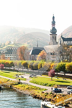 Landscape with town Cochem on river moselle. Fall season.