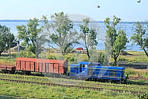 Landscape with the train and a lake photo