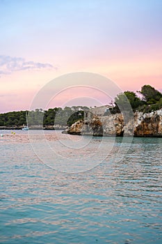 Landscape with turquoise, azure sea water, Cala Mondrago, Majorca island, Spain. Dusk