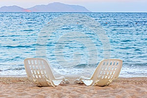 Landscape of Two Lonely beachchairs near the sea