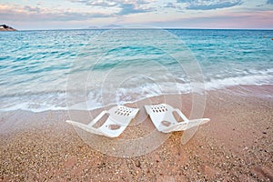 Landscape of Two Lonely beachchairs near the sea