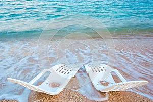 Landscape of Two Lonely beachchairs near the sea