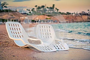 Landscape of Two Lonely beachchairs near the sea