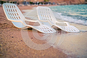 Landscape of Two Lonely beachchairs near the sea