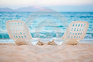 Landscape of Two Lonely beachchairs near the sea