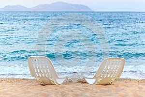 Landscape of Two Lonely beachchairs near the sea