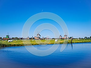 Landscape with typical dutch windmill village Zaanse Schans in Zaandam, Netherlands