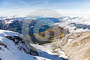 Landscape valley of Alps mountain range  with white cloud and blue sky background view from Jungfraujoch top of Europe,