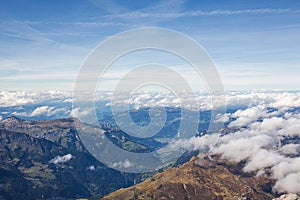 Landscape valley of Alps mountain range  with white cloud and blue sky background view from Jungfraujoch top of Europe,