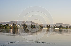 Landscape view across nile river to luxor west bank