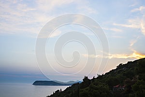 Landscape view across water to small islands at sunset in Croatia