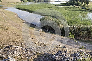 Landscape with a view of along lake